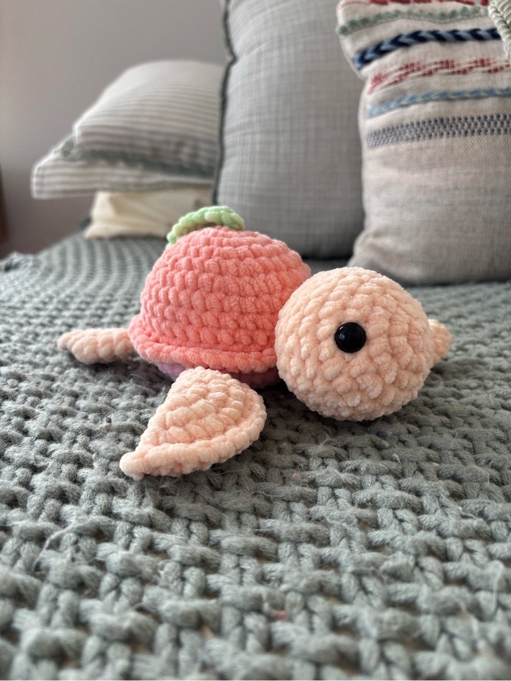 handmade crocheted turtle with peach shell